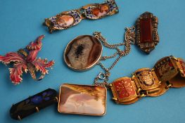 A Continental enamelled brooch, three other brooches, two bracelets etc.