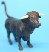 A small Austrian bronze bull, circa 1890, with ivory horns.  12 cm long