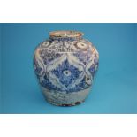 An 18th/19th century Islamic tinglazed earthenware blue and white globular shaped vase decorated