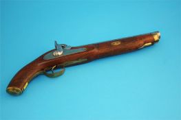 A percussion pistol with single barrel with engraved decoration. (Converted)  45 cm total length,