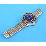A Ladies Breitling stainless steel and gold Ladies J. wrist watch, with blue dial and date aperture,