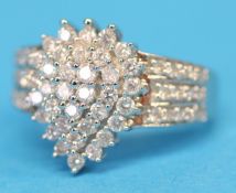 A 9ct white gold ring set with diamonds, approximately 1.0 carats, ring size "M".