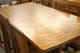 A Robert "Mouseman" Thompson oak refectory table with octagonal legs with carved mouse.  183 cm long