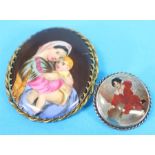 A Continental porcelain oval brooch of a woman and young boy and a sterling silver backed brooch. (