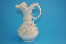 A large Belleek "Aberdeen" jug with applied flower decoration, printed second black mark.  23 cm