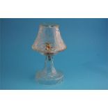 A cut glass table lamp and shade.  28 cm high