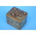 A small Japanese trinket box the lid decorated with flowers, birds and butterflies, the sides