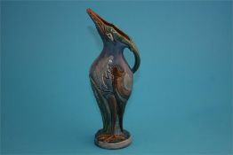 A late Victorian C H Brannam Barum ware pottery stork jug, impressed marks, dated 1898.  24 cm