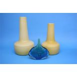 A pair of Continental cased glass vases and a M'dina "axe head" fish vase in blue and green,