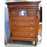 A Victorian mahogany straight front chest of drawers, the top with secret compartment, below a