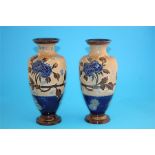 A near pair of Royal Doulton Slaters patent vases decorated with autumnal leaves and chrysanthemums,