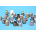 A collection of thimbles, one silver thimble by Charles Horner of Chester 1907, one 925 standard and