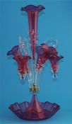 A modern Victorian style cranberry coloured glass epergne.  60 cm high.