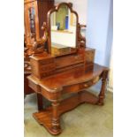 A Victorian mahogany duchess dressing table the back with central mirror flanked by 6 drawers, below