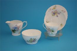 A Shelley "Wild Flowers" tea service comprising six cups, six saucers, six side plates, cake