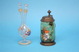 A German clear glass double oil/vinegar dispensing bottle decorated with enamel armorials; and a
