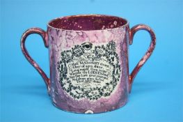 A large Sunderland purple lustreware masonic two handled loving cup with verse to the reverse.  13