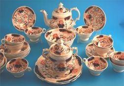 A Victorian tea set comprising teapot, sucrier, slop bowl, 2 cake plates, 12 cups and saucers.