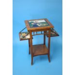 An Aesthetic style fold occasional table, the top inset with a decorative tile and each folding