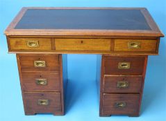A 19th century mahogany campaign pedestal desk, the top with leather insert and 3 drawers with flush