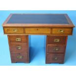 A 19th century mahogany campaign pedestal desk, the top with leather insert and 3 drawers with flush