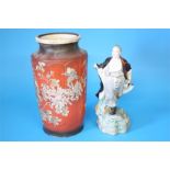 An Oriental figure of a warrior and an early 20th century satsuma vase. (2)