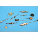 Eleven various Victorian 9ct brooches, seals etc.