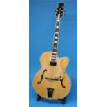 A Hermitage "Golden Eagle" electric/acoustic guitar with spruce top and maple board circa 1992,