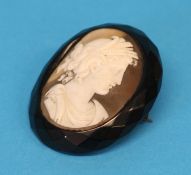 A Victorian Cameo and jet brooch.