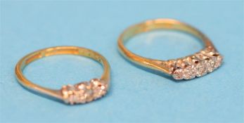 Two 18ct gold diamond rings.