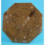 A Hopton Wood limestone octagonal charger with fossilized belemnites and ammonites.  40 cm.