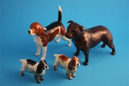 A Beswick Staffordshire bull terrier "Bandits Brintiga" 1982A, two spaniels and a beagle "Wendover