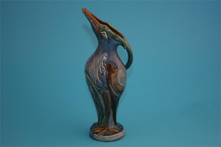 A late Victorian C H Brannam Barum ware pottery stork jug, impressed marks, dated 1898.  24 cm - Image 2 of 2