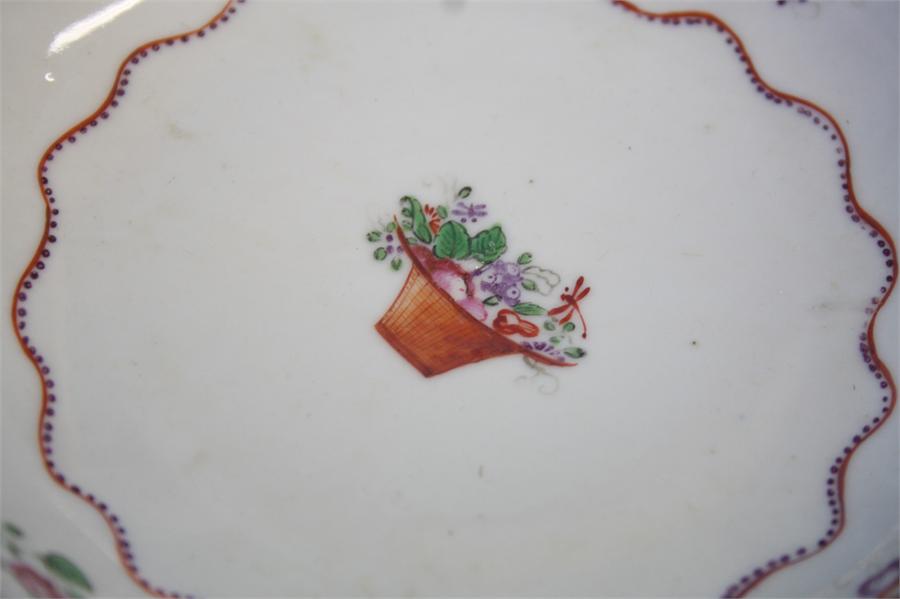 Five tea bowls and saucers and a spare bowl, each decorated with a sprig of flowers, 4 cups and - Image 4 of 5