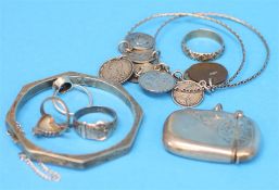 Four silver rings, a silver vesta, a sterling silver bracelet and 2 coin bangles.