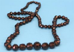 A string of jet beads.