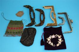 A collection of four vintage evening bags and five various spare handles.