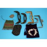 A collection of four vintage evening bags and five various spare handles.