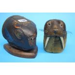 A 19th century Turtle's head with inset inkwell and a stuffed Otter's heads. (2)