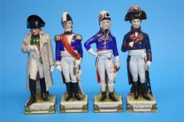 A set of eight German porcelain military figures stamped Made in GDR; four Capo Di Monti figures and