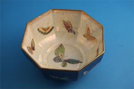 A Wedgwood lustreware octagonal bowl decorated with panels of decorative butterflies, printed mark