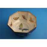 A Wedgwood lustreware octagonal bowl decorated with panels of decorative butterflies, printed mark