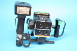 A polaroid mini portrait 402 camera and a Sunpack auto zoom 5000 Thryristor flash.
