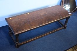 An oak long stool.  94 cm long