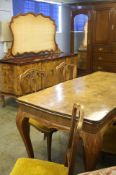 An Italian dining room suite comprising mirror back sideboard, table and six single chairs.