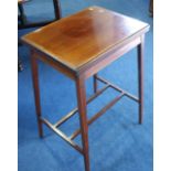 An Edwardian mahogany fold over card table.