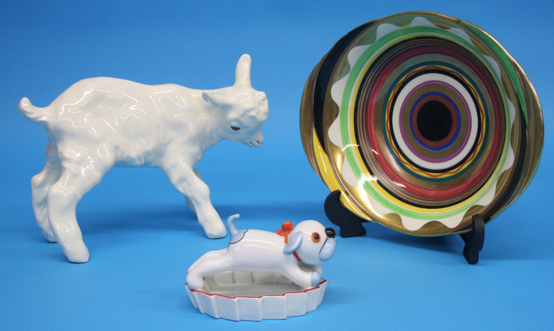 A Carlton Ware shallow bowl with multicolour concertina bands with gilt border, printed mark,