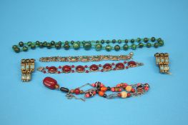 A malachite necklace and various bracelets and costume jewellery.