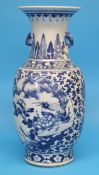 A Chinese blue and white vase decorated with birds and flowers.  43 cm high.
