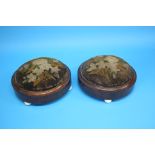 A pair of Victorian mahogany circular foot stools supported on porcelain ball feet.  29 cm